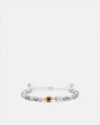 Bracelet pierre naturelle Howlite blanche avec perle projection photo dorée et cordon réglable