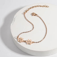 Bracelet patte chien rose gold gravé noms animaux - cadeau maîtresse chien chat Petale Paris