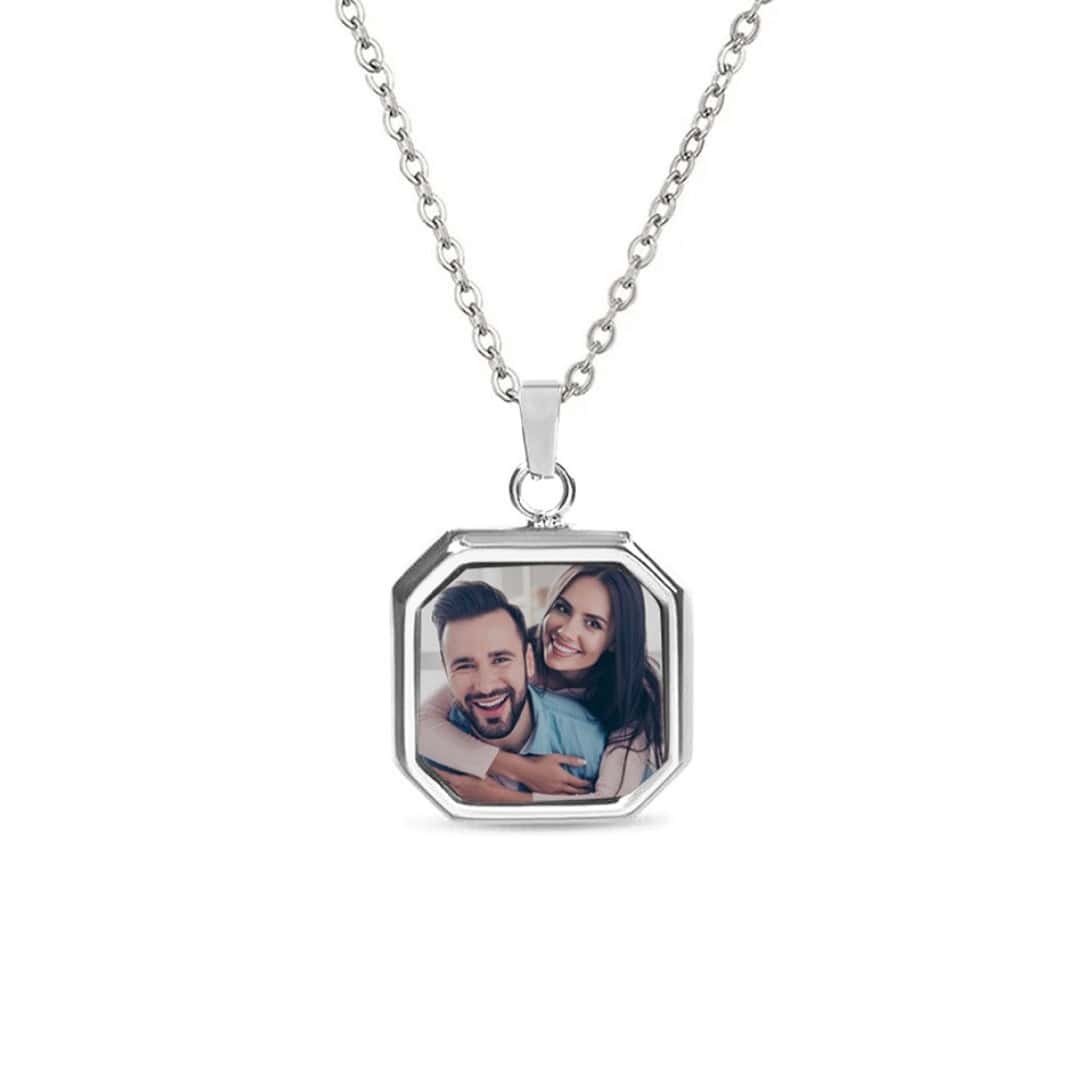 Pendentif photo thermique argenté, photo de couple révélée sur la plaque